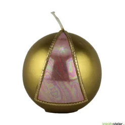 Goldene Weihnachtskerze mit rosafarbigem Dreieck