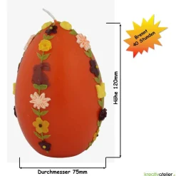 große Ostereikerze in orange mit doppelter, frühlingshafter Blumenranke verziert, Osterdeko, Ostergeschenk