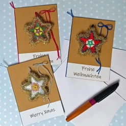 Grußkarte Weihnachten glitzernder Stern gehäkelt mit Wunschtext