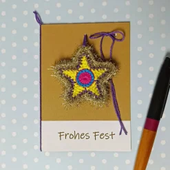 Grußkarte Weihnachten glitzernder Stern gehäkelt mit Wunschtext