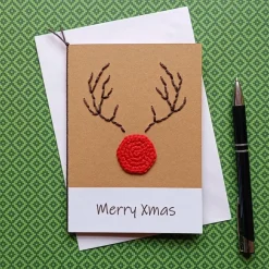 Grußkarte Weihnachten Rentier Rudolph the Red-Nosed Reindeer gehäkelt und gestickt mit Wunschtext