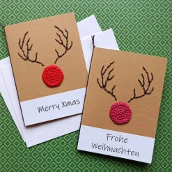 Grußkarte Weihnachten Rentier Rudolph the Red-Nosed Reindeer gehäkelt und gestickt mit Wunschtext
