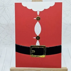 Handgefertigte Weihnachtskarte „Santa’s Outfit“ – festliche Karte mit Golddetails aus Effektpapieren