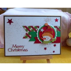 Handgemachte Weihnachtskarte mit Schneemannkopf