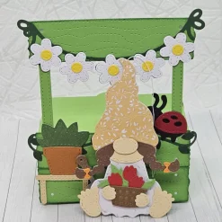 Handgemachte Wichteline-Gartenbox – frühlingshafte Geschenkverpackung mit Blüten und Marienkäfer