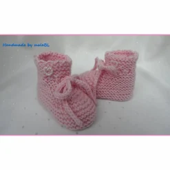 Handgestrickte rosa Babyschuhe aus Merinowolle – Neugeborenenschuhe zum Binden