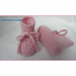 Handgestrickte rosa Babyschuhe aus Merinowolle – Neugeborenenschuhe zum Binden