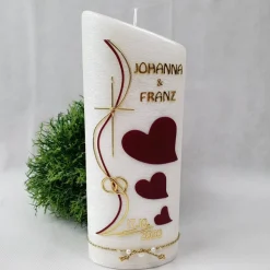 Hochzeitskerze Perlmutt geriffelt - Ellipse abgeschrägt mit Herzen - dunkles BORDEAUX-GOLD