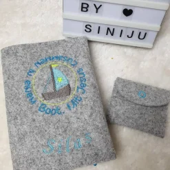 Individuelle Gotteslobhuelle  aus Wollfilz, personalisiert bestickt