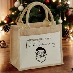 Jutetasche Weihnachten/Nikolaus mit Motiv – nachhaltige Geschenkverpackung mit Einsteckfach