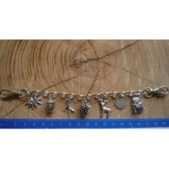 Kinder - Charivari, antik-silberfarben, 7 Trachtenanhänger, ca. 20,5 cm