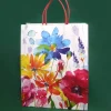 Kleine Papier Tragetasche mit bunten Blumen