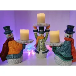 Lustiger Schneemann mit Kerze