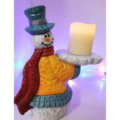 Lustiger Schneemann mit Kerze
