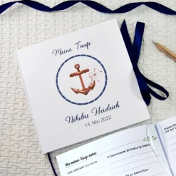 maritimes Gästebuch & Album zur Taufe mit Anker & Sprenkeln in Marineblau & Kupfer; blanko oder mit Fragen