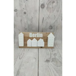 Minihäuser auf Holzklötzchen und Plott