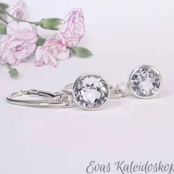 Ohrbrisuren mit großen runden Weißtopasen in Silberfassung