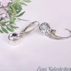 Ohrbrisuren mit großen runden Weißtopasen in Silberfassung