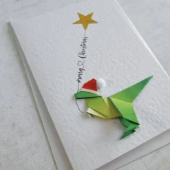 Origami Weihnachtskarte Dinosaurus mit Stern - Einzigartige Weihnachtskarte - Frohe Weihnachten - Papierkunst