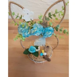 Osterdeko auf Holz mit Ohren