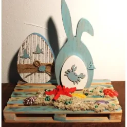 Osterdeko MARITIM  Collage auf einer kleinen Holzpalette Osterdekoration Osterhase Osterei Seestern Muscheln Ostern