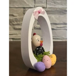 Osterdekoration - Osterei mit Schleife und Osterküken