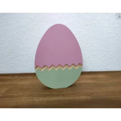 Osterei mit Zackenmuster aus Holz