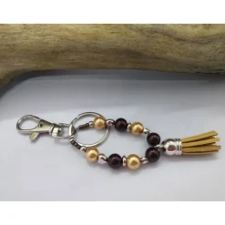 Personalisierbarer Schlüsselanhänger Tropfenform Braun-Gold – Unikat von derWolltiger