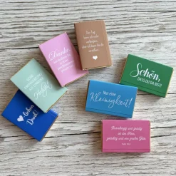 Personalisierte Schokolade als Gastgeschenk zur Kommunion | Personalisierung mit Foto und Wunschtext