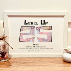 Personalisiertes Geldgeschenk zum 25. Geburtstag für Gamer im Retro-Bilderrahmen