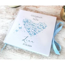 personalisiertes Gästebuch & Album zur Taufe mit Herz aus Schmetterlingen in Hellblau blanko o. mit Fragebogen