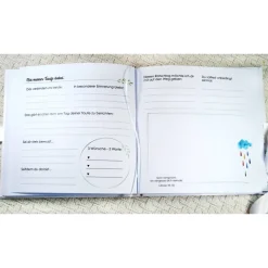 personalisiertes Gästebuch & Album zur Taufe mit Kreuz aus Fischen in Hellblau blanko o. mit Fragebogen