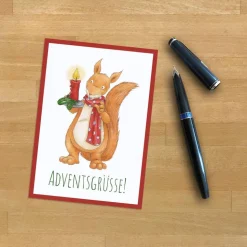 Postkarte: Adventsgrüße, Adventskarte, Weihnachtskarte, Eichhörnchen · A6 · Aquarell, Buntstift, klimaneutraler Druck