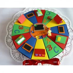 Schachteltorte zur Einschulung, erster Schultag, Geldgeschenktorte, Gastgeschenktorte 23cm Ø, in Regenbogenfarben