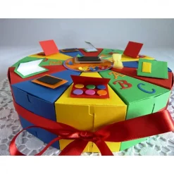 Schachteltorte zur Einschulung, erster Schultag, Geldgeschenktorte, Gastgeschenktorte 23cm Ø, in Regenbogenfarben