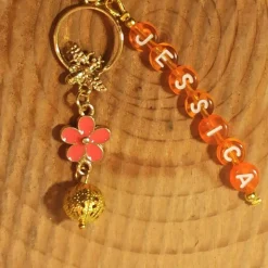 Schl.-Anhänger „Blume“ mit/ohne Namen personalisierbar