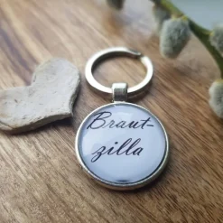Schlüsselsanhänger Brautzilla Hochzeit schwarz weiß Cabochon silberfarbe Fassung 25mm lustiges Geschenk