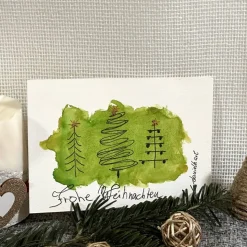 Schöne Weihnachtskarte mit Weihnachtsbäumen - Frohe Weihnachten - handgemalte Karte (A6) mit hochwertigen Aquarellfarben