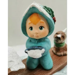 Schneemädchen mit Schlitten