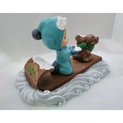 Schneemädchen mit Schlitten