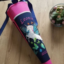 Schultüte aus Stoff bestickt Schmetterlingseinhorn, Namen und Datum 70cm Rohling