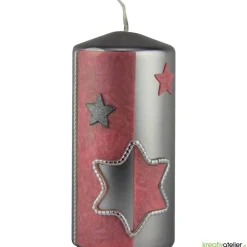 Silberne Weihnachtskerze mit rosafarbigem Stern