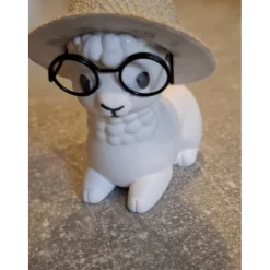 sitzendes kleines Alpaka aus Raysin - niedliche Dekoration