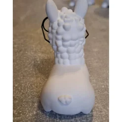 sitzendes kleines Alpaka aus Raysin - niedliche Dekoration