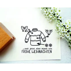 Stempel mit Stempeltext: "Anleitung Ugly Christmas Sweater... und jetzt aber sowas von Frohe Weihnachten"