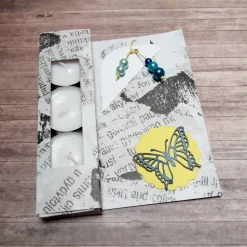 Teelichtkarte mit Schriften und Schmetterling