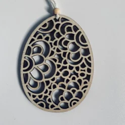 7-teilige Eieranhänger aus Holz, Holzeier als Dekoration oder Geschenk zu Ostern, filigrane gelaserte Eier