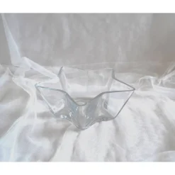 Tischdeko. Glasschale in Sternform mit Weihnachtsdeko in kupfer