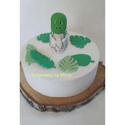 Tortendeko Dino aus den Ei  Urzeittier Tortenaufleger Fondantfigur Zuckerfigur