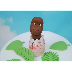 Tortendeko Dino aus den Ei  Urzeittier Tortenaufleger Fondantfigur Zuckerfigur